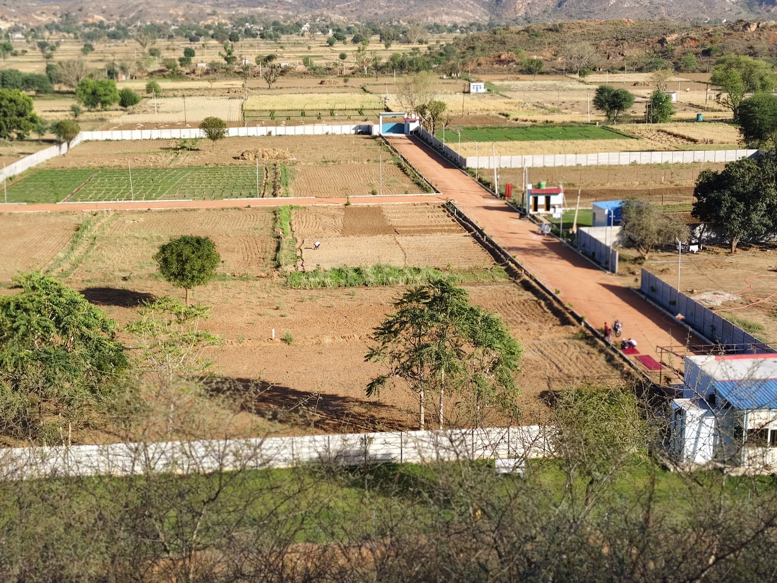 farmhouse-investments-near-Alwar-Khairthal-lush-green-Rajasthan-land-Vyom-Regency 